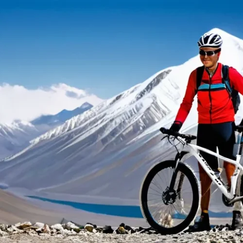 Home 23 타지키스탄 산악 자전거 투어 - **Prompt: Summiting the Roof of the World**
"A lone male or female mountain biker, seen from a s...